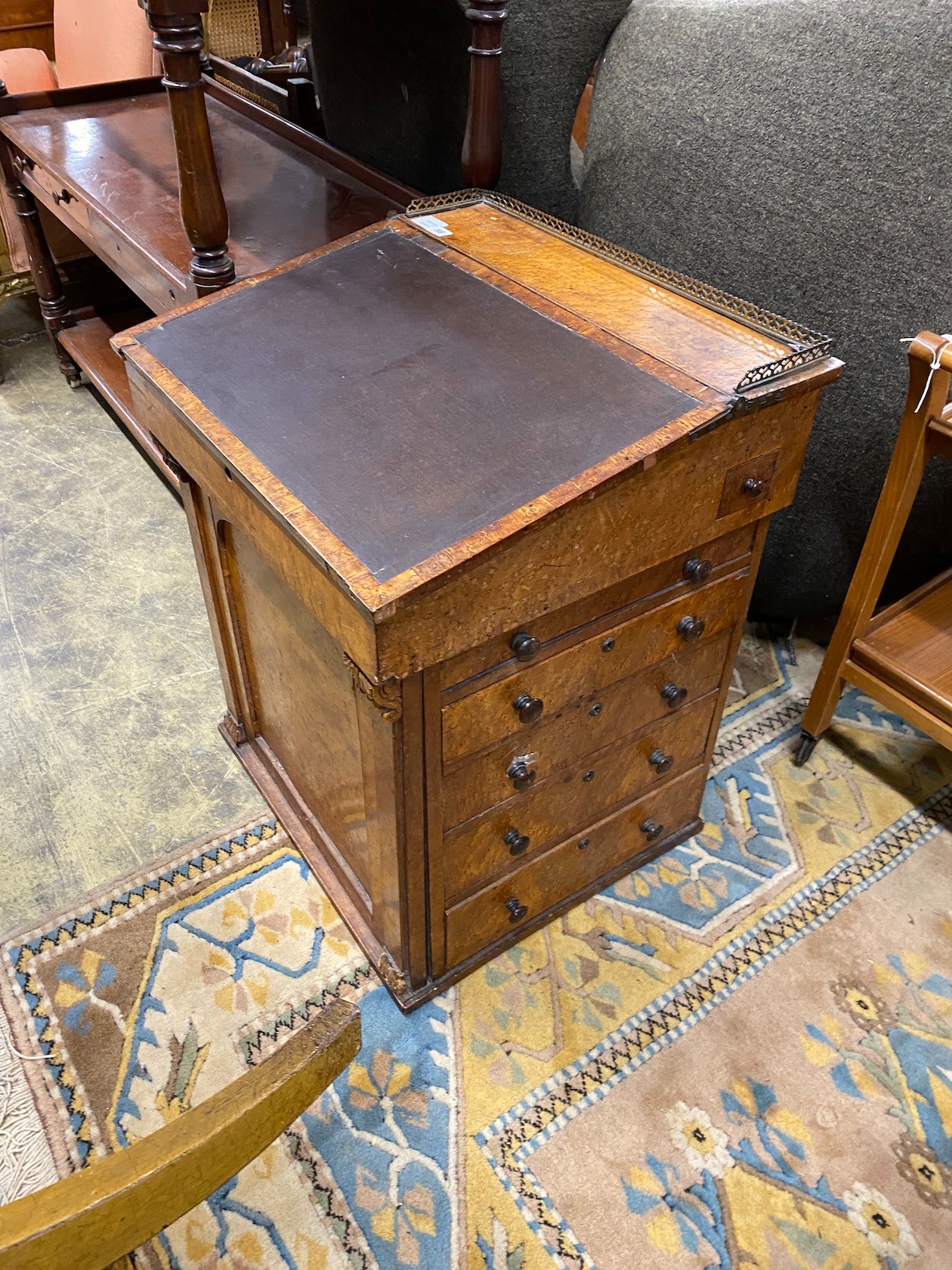 A Regency bird's eye maple veneered davenport (in need of restoration), width 61cm, depth 55cm, height 76cm